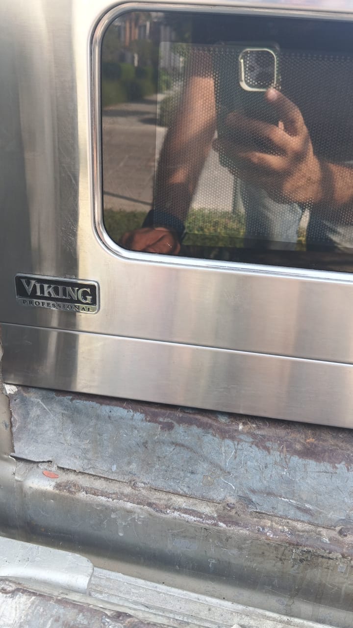 Professional range door and surround during repair in the UAE