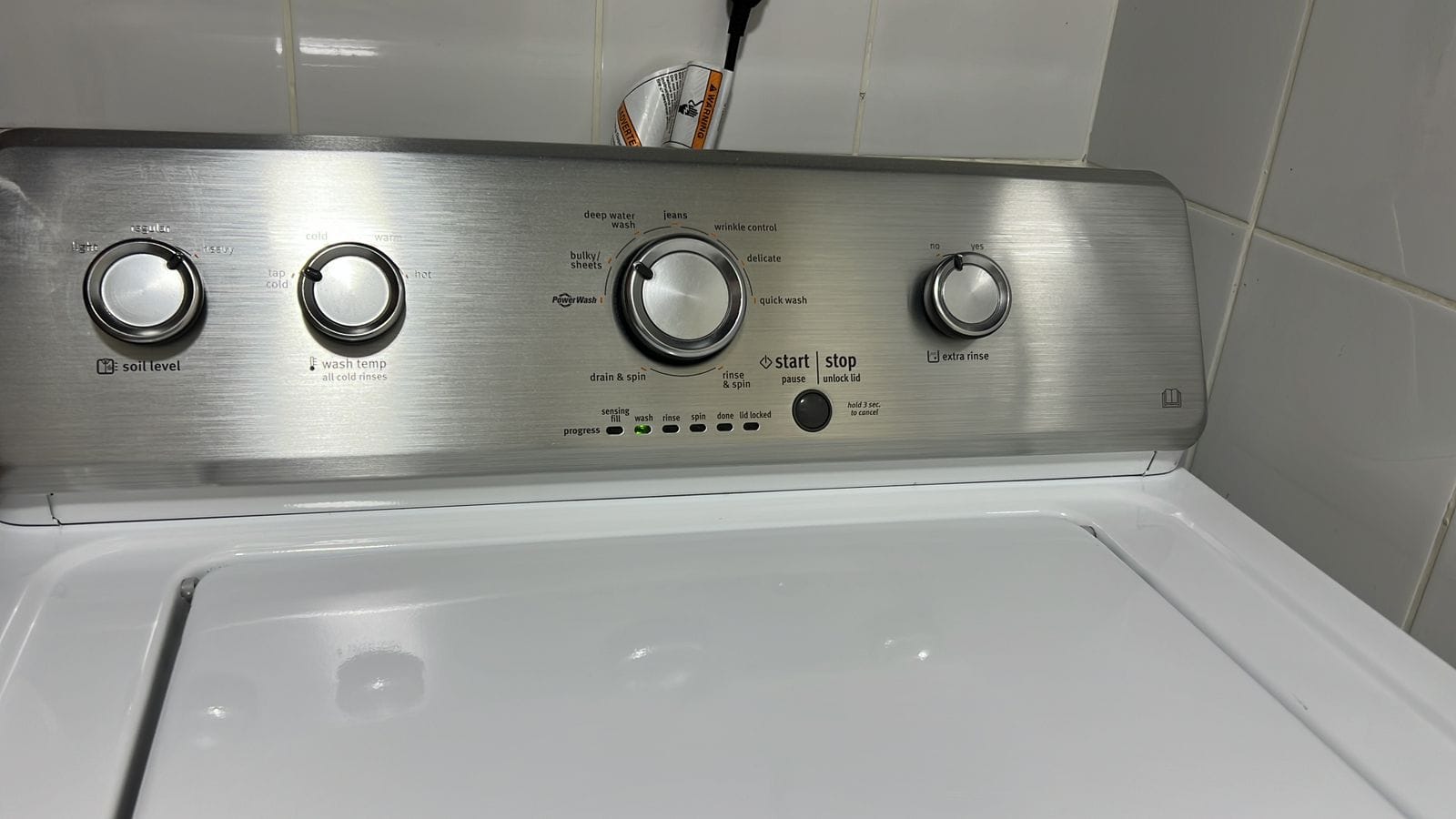 Top-load washing machine control panel during diagnosis in the UAE