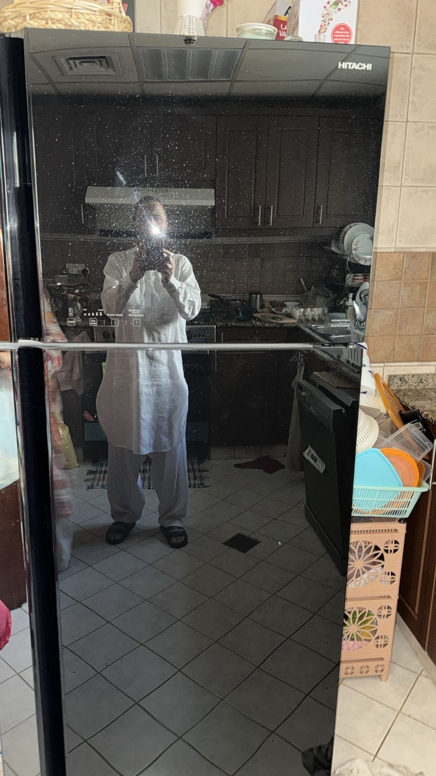 Refrigerator door and controls checked on a UAE service call