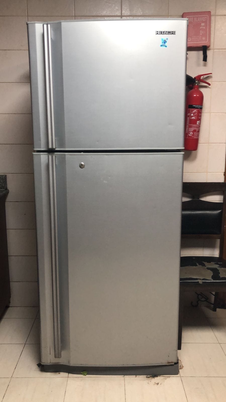 Top-mount refrigerator attended on a UAE service call