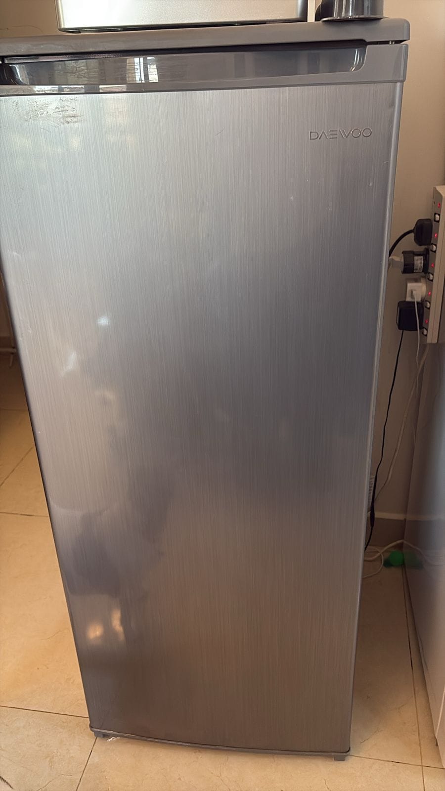 Upright freezer attended on a UAE service call